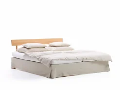 Bett Jukai Pur, mit Betthaupt und Bettrahmenhousse, inkl. integriertem Lattenrost, 160 x 200 cm, Baumwollstoff Ondula Greige (139), Buche